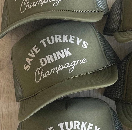 Save turkeys, drink champagne trucker hat