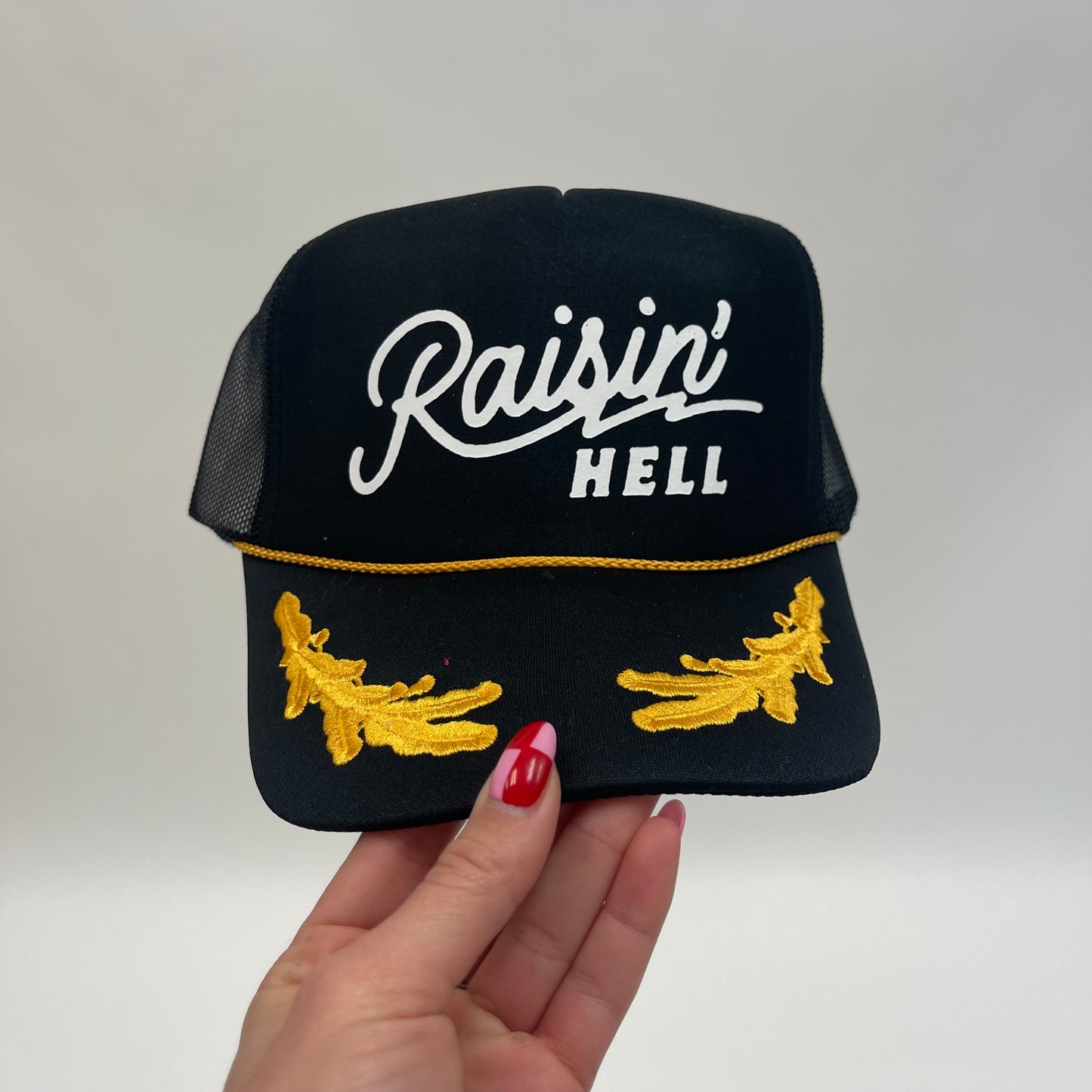 Raisin' Hell Trucker Hat