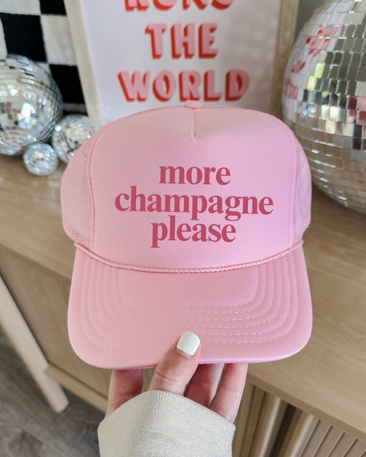 more champagne please Trucker Hat
