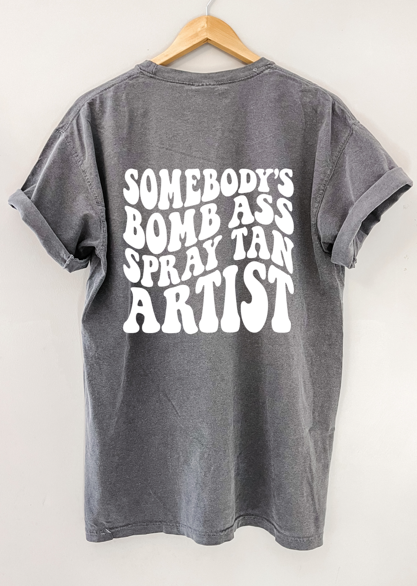 Somebody’s Bomb Spray Tan Artist